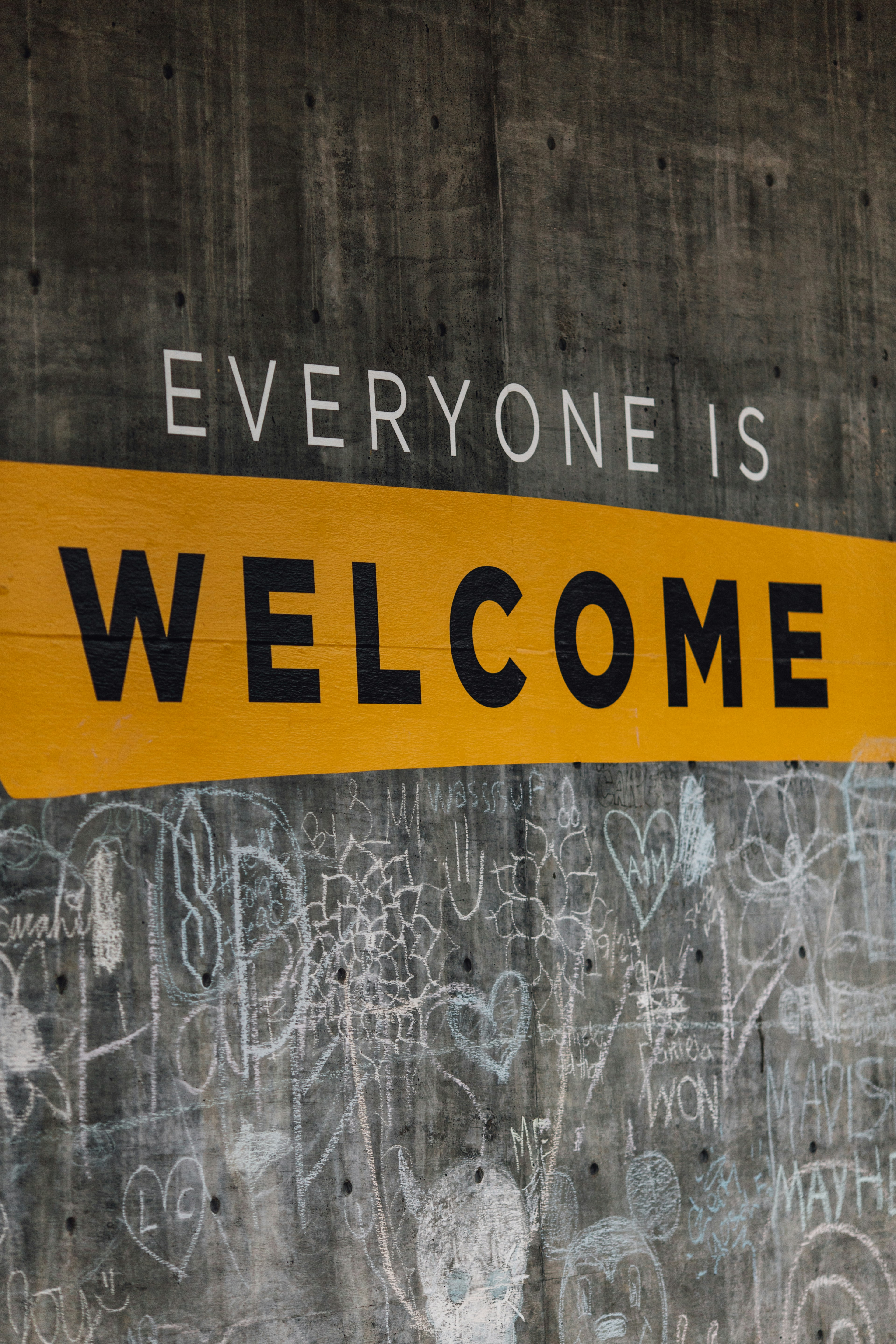 A sign reading "Everyone is welcome". Photo by Katie Moum on Unsplash